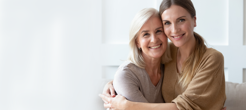 Two woman hugging